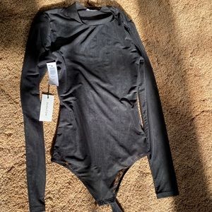 Brand new Babaton long sleeve sheer bodysuit